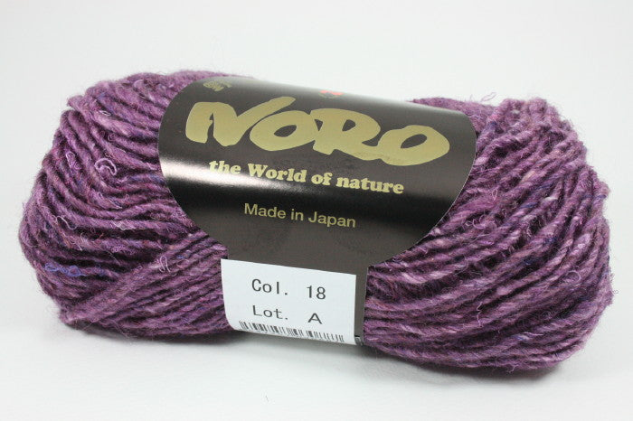Noro Silk Garden Solo yarn in Chiba (18), a full purple ball with its label