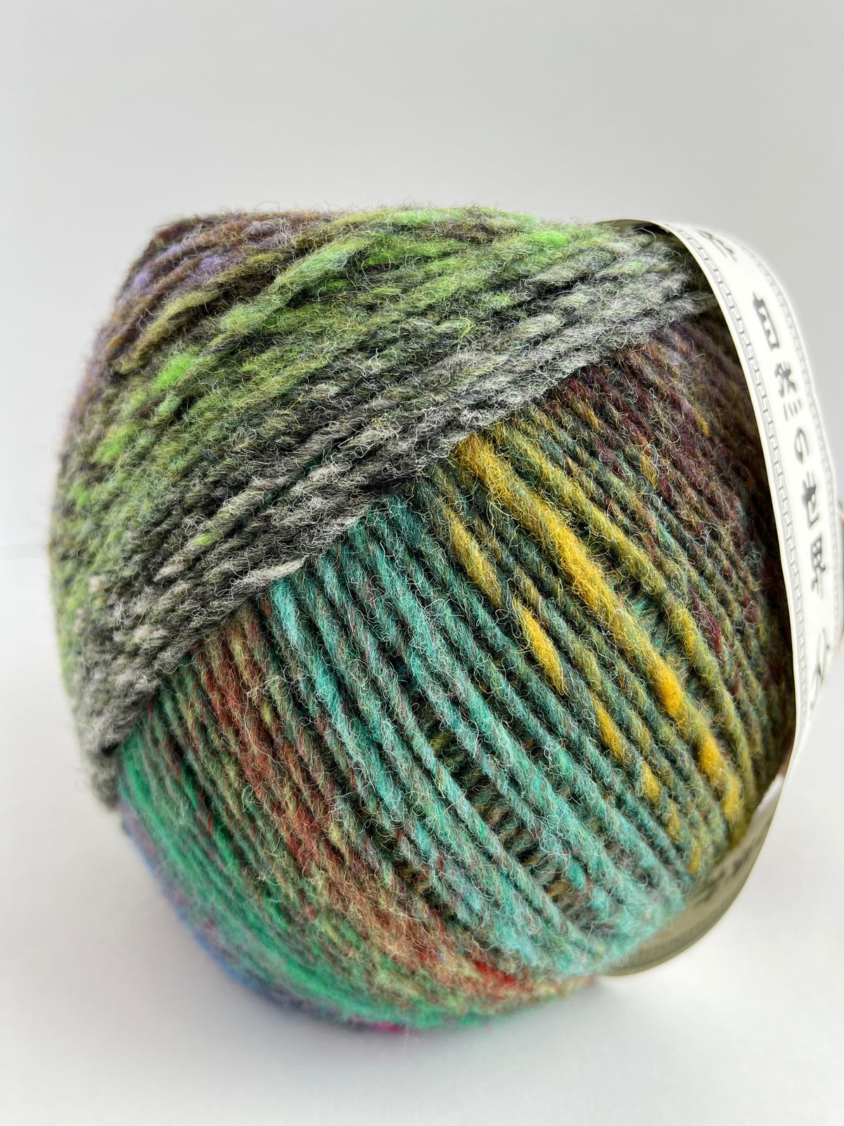 Noro Ito yarn — Uruma 6, full ball in green, teal, gray and purple